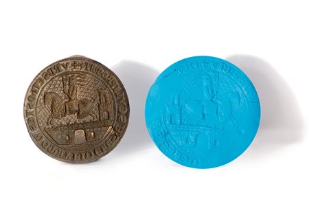 Grande sigillo circolare in bronzo con stemma nobiliare raffigurante città turrita e cavaliere, con iscrizione, secoli XIV - XV