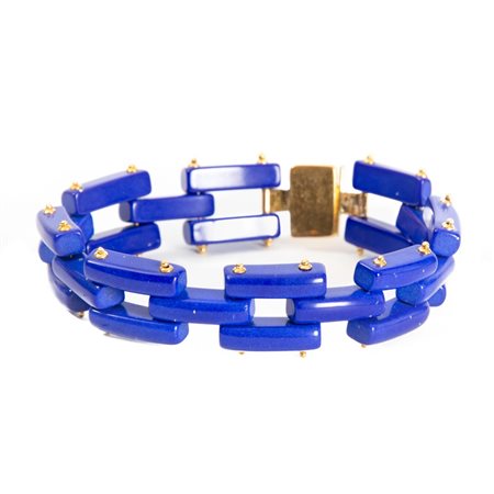 BRACCIALE in oro giallo 18 KT e pasta di lapis (g. 15,90).