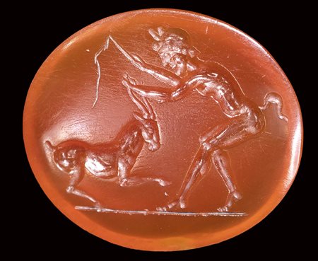 A roman carnelian intaglio. Faun with goat. <br><br>1st century B.C. - 1st century A.D.