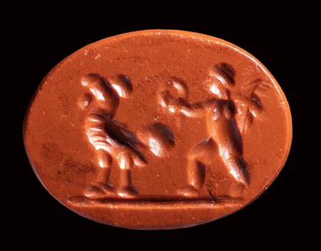 A roman red jasper intaglio. Winged eros with rooster. <br><br>1st - 2nd century A.D.