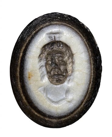 A roman nicolo intaglio. Frontal bust of Zeus Serapis.<br><br>2nd century A.D. 