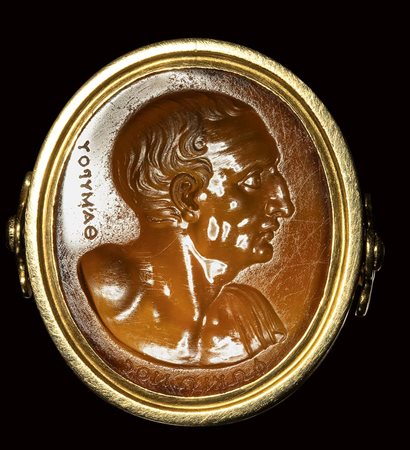 A fine neoclassical Poniatowski  carnelian intaglio signed Thamyros, set in a gold ring. Bust of Phocion. 19th century.