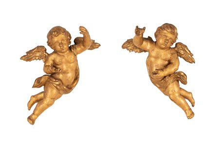  
Coppia di putti in legno dorato Roma XVIII secolo
 cm 58x48