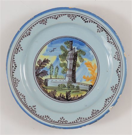 Piatto in ceramica con decoro policromo con castelletto nell'umbone. Pavia,...