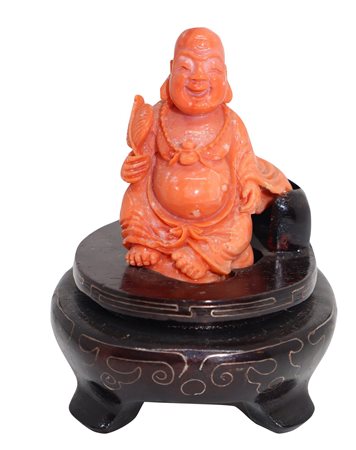 Buddha ridente in corallo