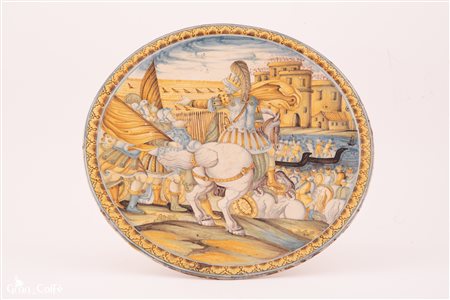 Manifattura castellana dell'ultimo quarto del XVII secolo. Bottega Grue (?) ( - ) 
Alzata in maiolica istoriata con una scena bellica. La presa di Gerusalemme. Il soggetto in primo piano rimanda a una incisione del Tempesta. 
 Ø cm 28