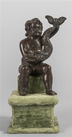 # Putto con delfino, scultura in bronzo a patina 