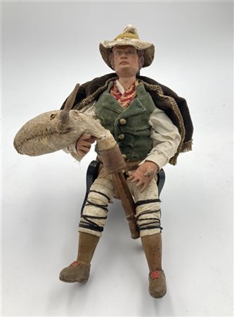 Manifattura napoletana del secolo XIX. "Zampognaro" scultura da presepe in terr