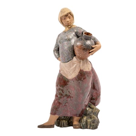 LLADRO' 
Scultura in ceramica raffigurante "Aldena Gallarda"