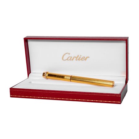 CARTIER PENNA in oro placcato entro astuccio originale.