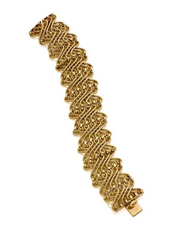 Bracciale a fascia intrecciata in oro giallo, g 82,26 circa, lungh. cm 18,80 ci