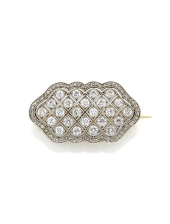 Broche in platino e diamanti per complessivi ct. 2,30 circa, pin in oro giallo,