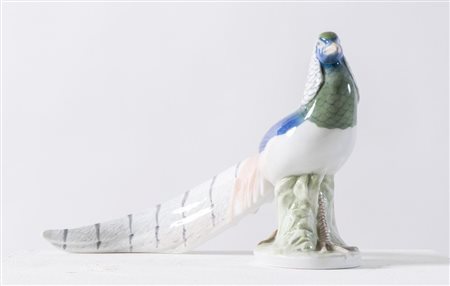 ROYAL COPENHAGEN "Uccello del paradiso". Scultura in porcellana policroma. Cm...