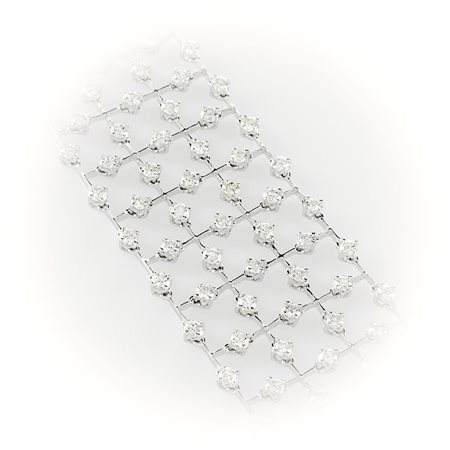 Bracciale a fascia morbida in oro bianco e diamanti bianchi taglio brillante realizzato da pregevole manifattura valenzana 