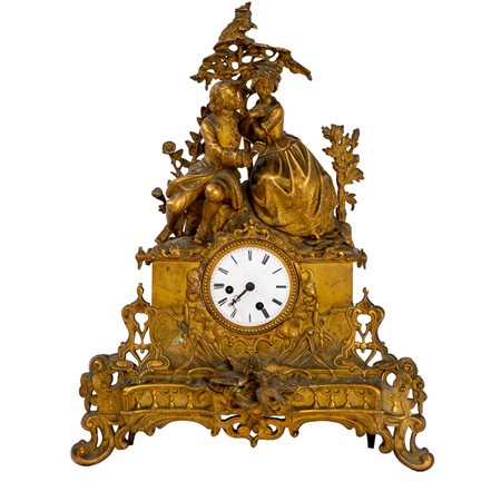 MANIFATTURA FRANCESE XIX SECOLO, Orologio in bronzo dorato