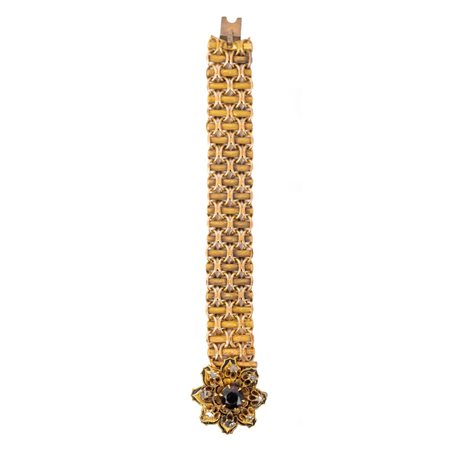 BRACCIALE in oro 9 KT con diamanti e granato centrale