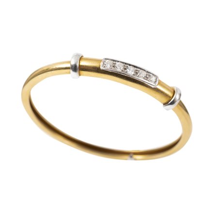 BRACCIALE rigido in oro giallo e bianco 18 KT