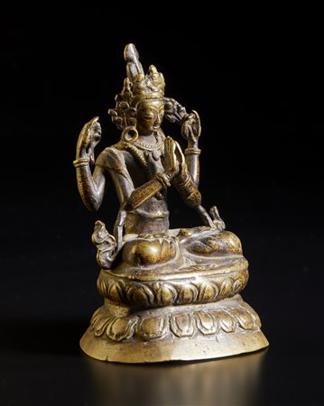  Arte Himalayana - Scultura in bronzo raffigurante Avalokitesvara 
Nepal, inizi XX secolo.