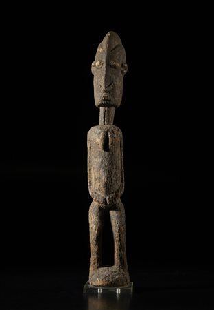  Arte africana - Mali, Dogon.
Figura di Nommo.
Legno e depositi. 
XIX sec.