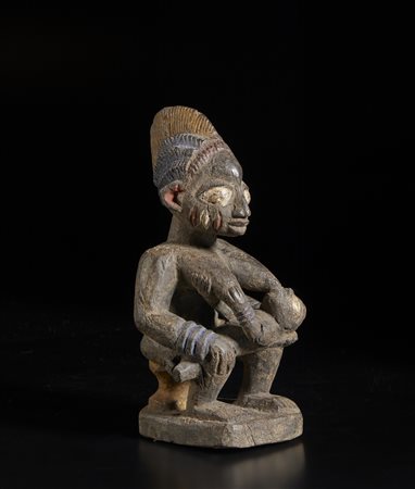  Arte africana - Nigeria, Yoruba.
Maternità.
Legno e pigmenti.