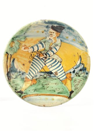 Piatto &quot;Arlecchino&quot;, Montelupo, sec. XVII, in maiolica, superficie...