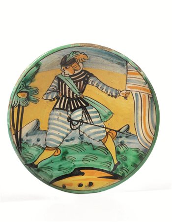 Piatto &quot;Arlecchino&quot;, Montelupo, sec. XVII, in maiolica, superficie...