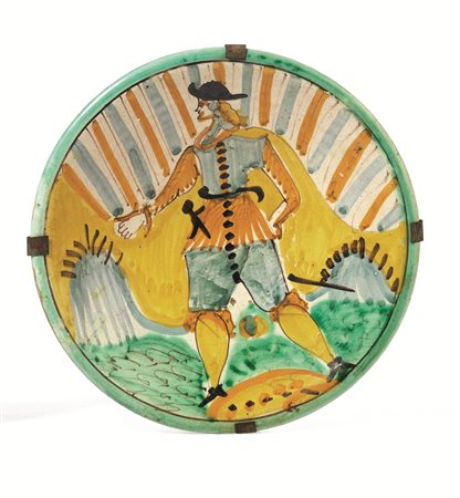 Piatto &quot;Arlecchino&quot;, Montelupo, sec. XVII, in maiolica, superficie...