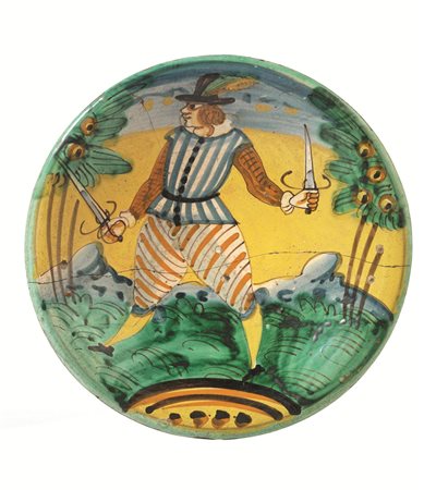 Piatto &quot;Arlecchino&quot;, Montelupo, sec. XVII, in maiolica, superficie...