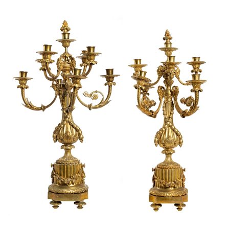 COPPIA CANDELABRI  sei fiamme in bronzo dorato