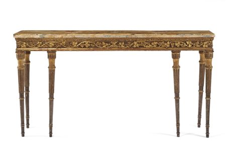 Antica console in legno intagliato, dorato e laccato con fascia riccamente deco