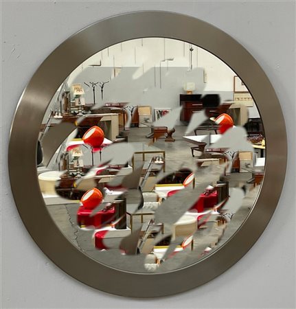 Specchio di forma tonda con cornice in metallo cromato. italia, anni '60/'70. (