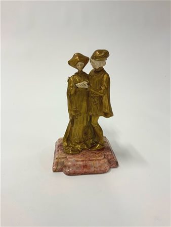 LOUIS SOSSON Scultura in bronzo dorato e osso su base in onice, raffigurante ama