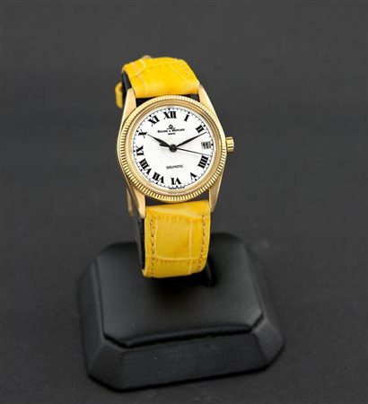 BAUME & MERCIER Solo tempo, modello "Baumatic" anni '80 Diam 31 Cassa in oro...