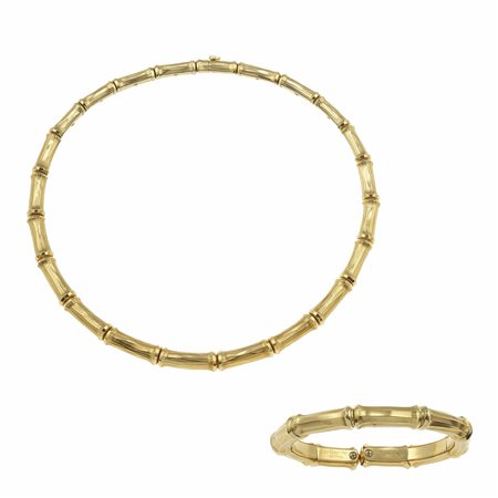 Cartier. Demi-parure "Bamboo" composta da girocollo e bracciale