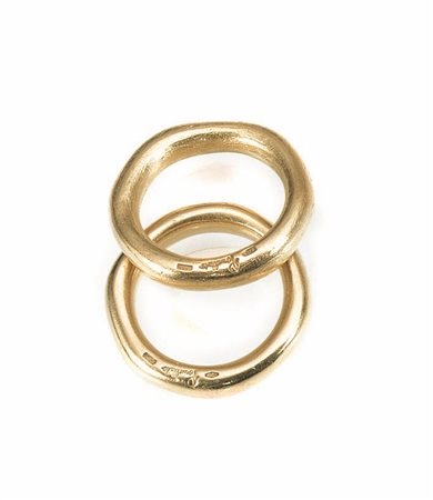 Due anelli, Pomellato, oro giallodi forma irregolare, punzone 750 e firma, g 30