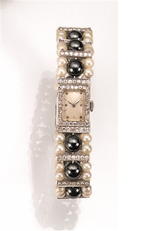 Bracciale-orologio Bulova per Serafini, Firenze, anni '60, in oro bianco,...