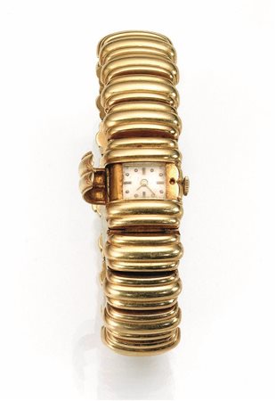 Bracciale-orologio Longines, anni '50, in oro giallo 18 ktCassa rettangolare...