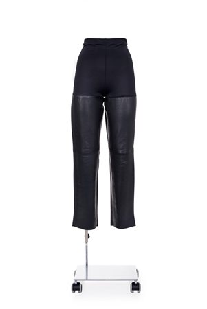 MAISON MARTIN MARGIELA Leather trousers with jersey part DESCRIPTION: Black...