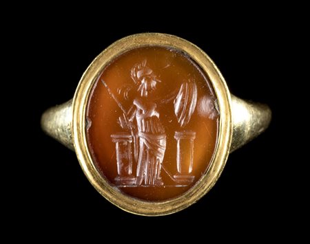 A ROMAN CARNELIAN INTAGLIO SET IN A MODERN GOLD RING. ATHENA. 