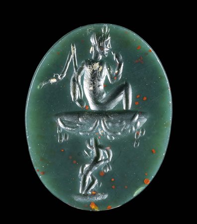A ROMAN MAGICAL BLOODSTONE INTAGLIO. HARPOKRATES AND HELIOS. 
