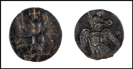 A LOT OF 2 LATE ROMAN HEMATITE AND SILVER INTAGLIOS; EAGLE WITH CROSS AND AN ALLEGORICAL SCENE.