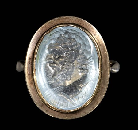 A FINE RENAISSANCE BERYL INTAGLIO SET IN A GOLD RING. PORTRAIT OF A ROMAN EMPEROR.