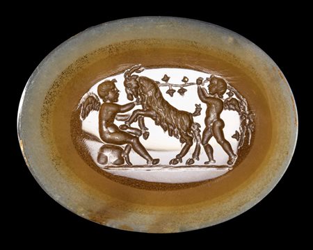 A NEOCLASSICAL AGATE INTAGLIO. TWO EROTES PLAYING WITH A GOAT. 