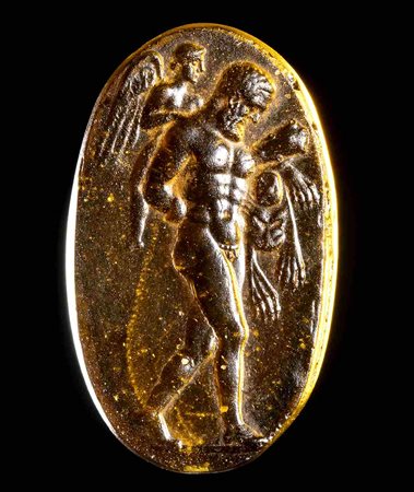 A GRAND TOUR GLASS PASTE CAST IMPRESSION AFTER AN INTAGLIO. HERCULES SUBDUED BY EROS.