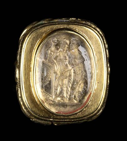 A GLASS IMPRESSION SET IN A GILDED FOB SEAL. VENUS AND MARS.