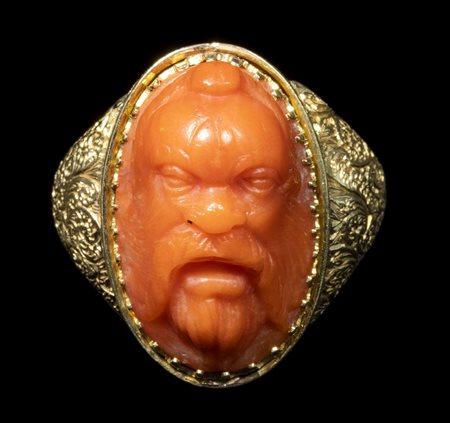 A LARGE CORAL CAMEO SET IN A GEORGIAN GOLD RING. BEARDED HEAD OF A RIVER GOD. 