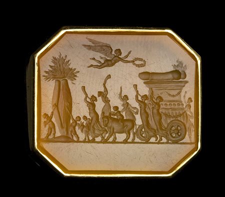 A NEOCLASSICAL LARGE CARNELIAN OCTAGONAL INTAGLIO SET IN A MODERN GOLD RING. EROTIC PROCESSION OF A PHALLUS. 