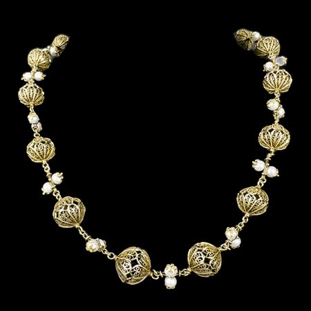 Collana in oro 18kt. con perle, composta da una sequenza di boules in...