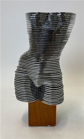 Otto Monestier "Eva" 
Scultura-multiplo dinamica in plastica cromata su base in