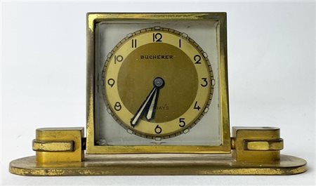 Bucherer. Orologio da scrivania in ottone dorato. Quadrante a fascia a numeri a